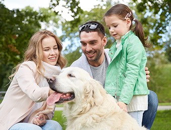 Happy family with dog