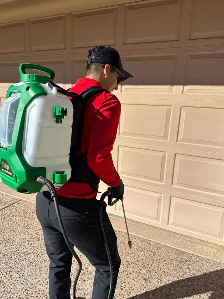 A boydstun pest control technician with a gpc backpack